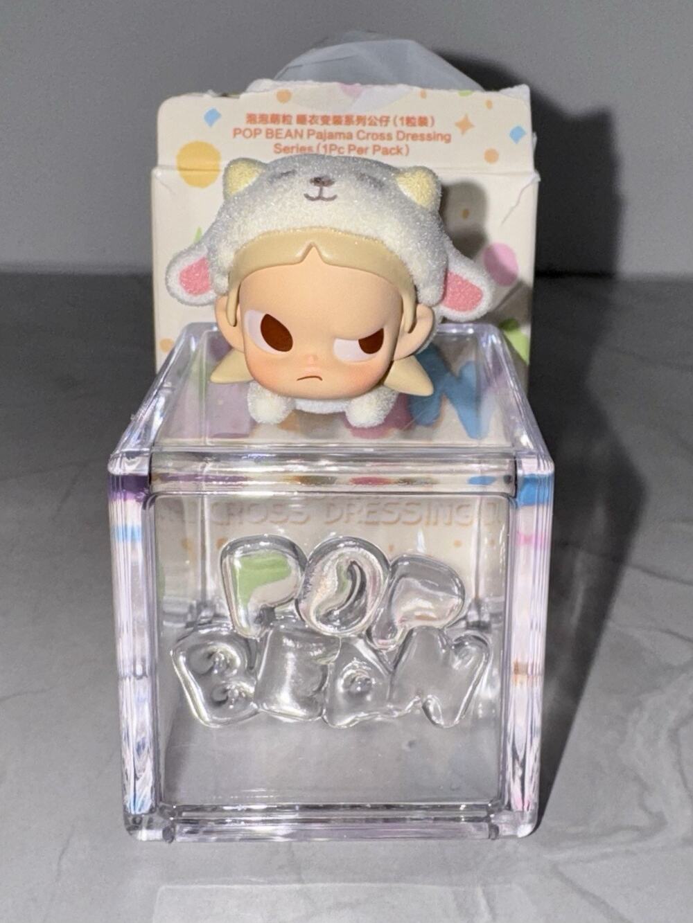 POP MART Zsiga Lying Lamb figure from the Pop Bean Pajama Party Series